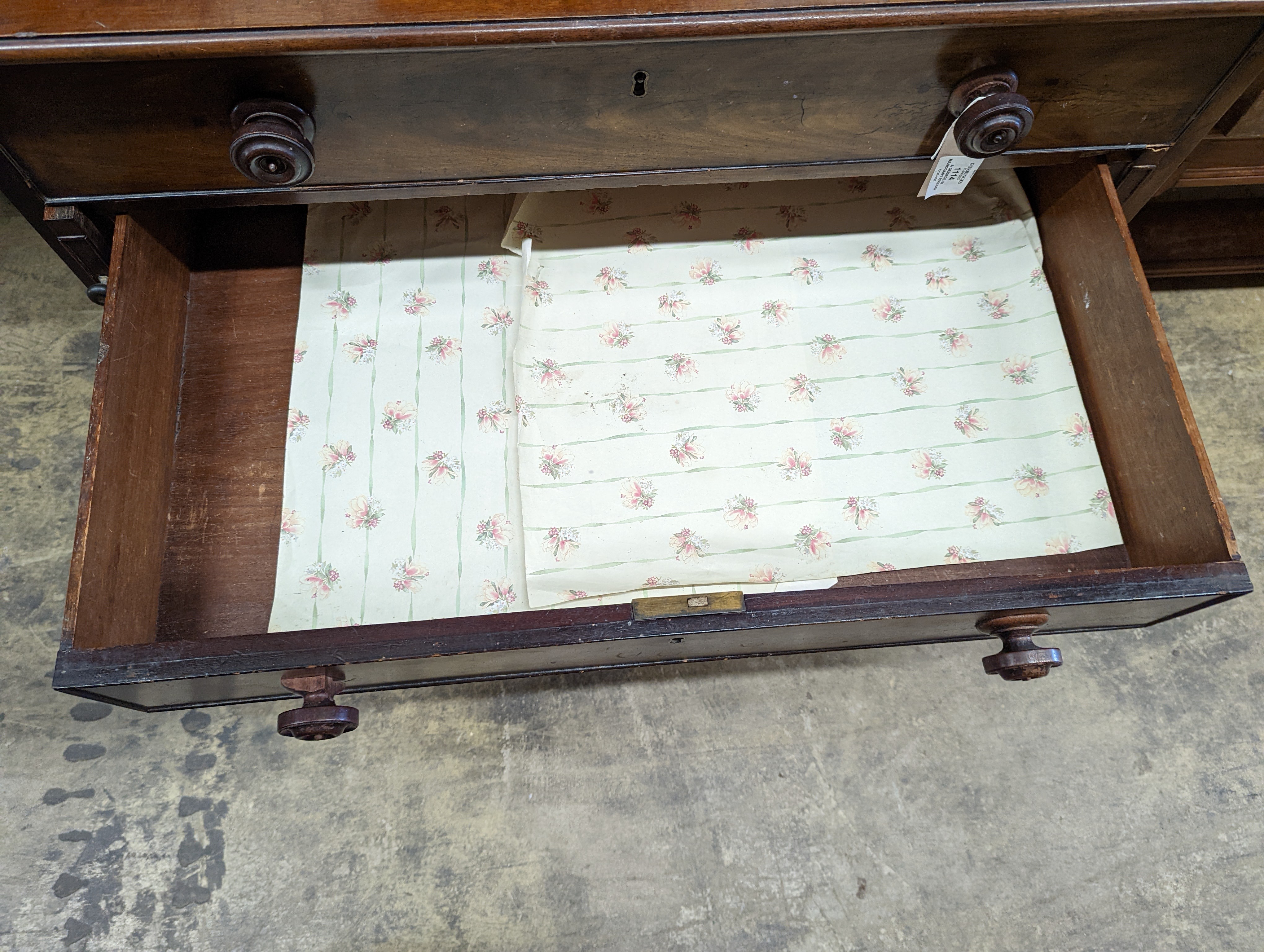 A George III mahogany dressing chest, with a fitted top drawer and later handles, width 91cm, depth 56cm, height 79cm